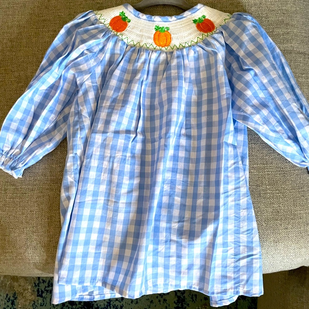New without tags 12 month long sleeve smocked pumpkin dress